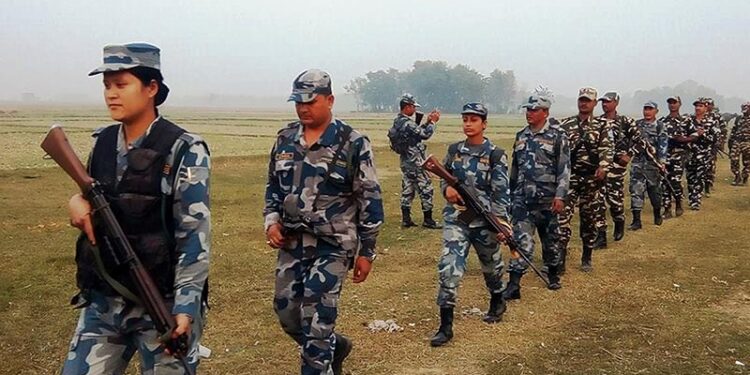 The Armed Police Force (APF) Nepal and Indian Seema Suraksha Bal (SSB) jointly patrol the area along the Nepal India border, 1.5 kilometre east of Gaur, the district headquarters of Rautahat, on Friday, December 1, 2017. Photo: Prabhat Kumar Jha
